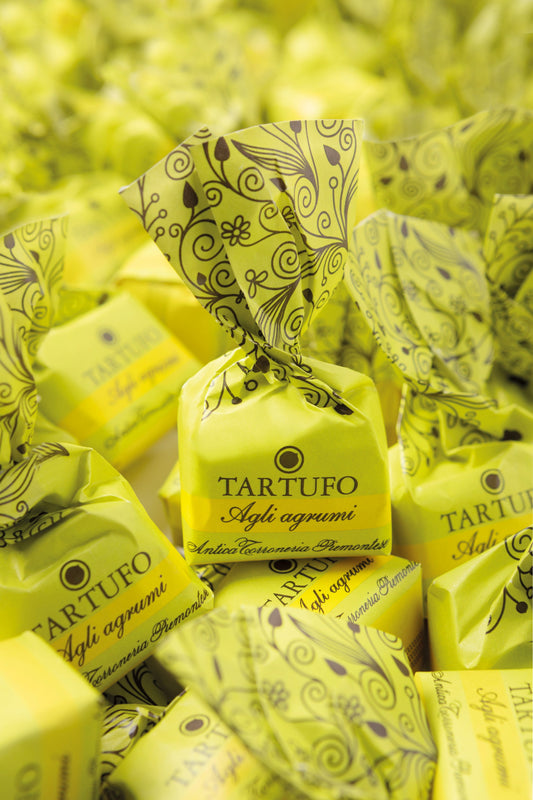 Tartufo dolce Agli agrumi süße Trüffel-Praline mit Zitrusfrüchten, 14 g einzeln verpackt